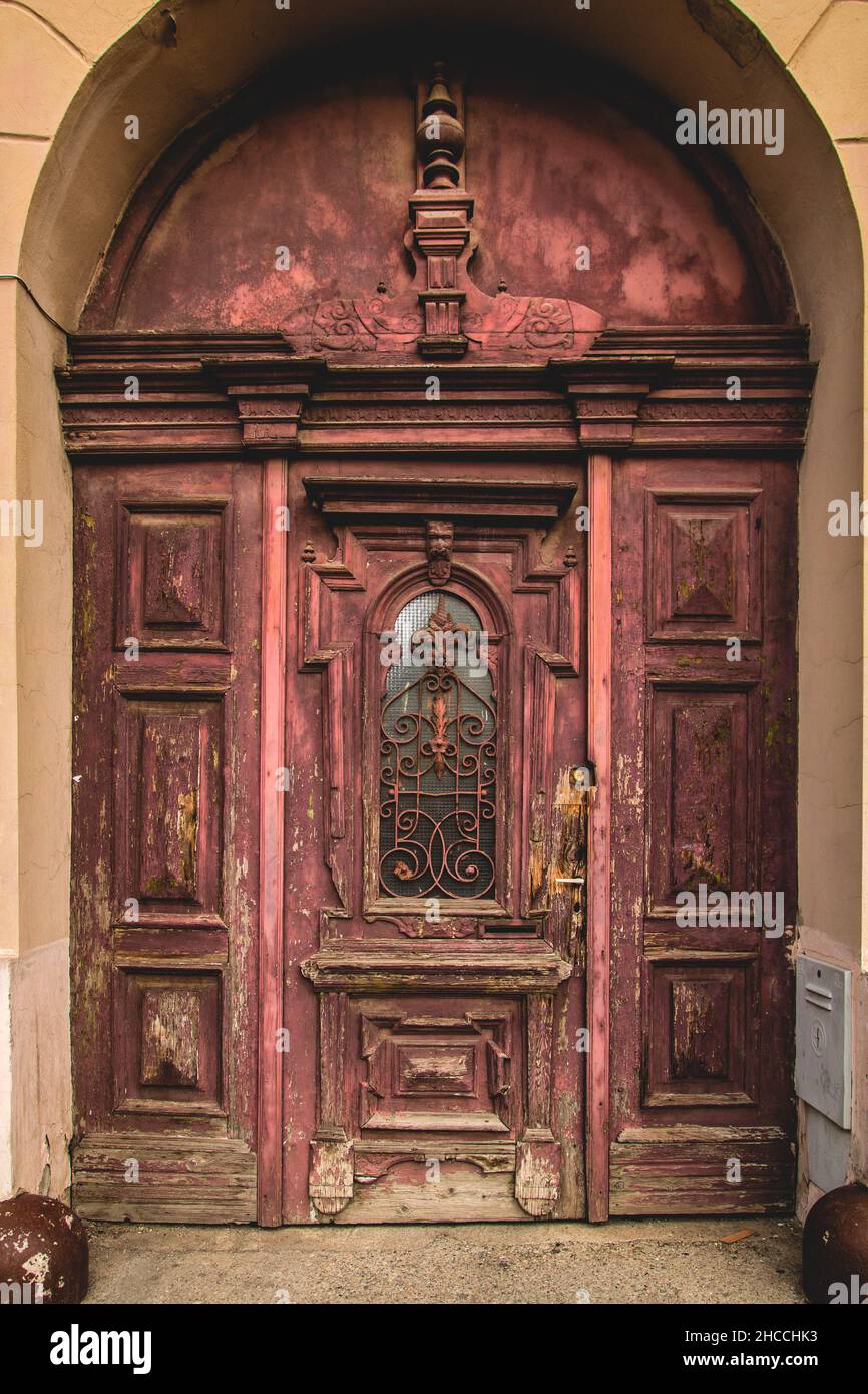Antique wooden door with decorations Stock Photo Alamy