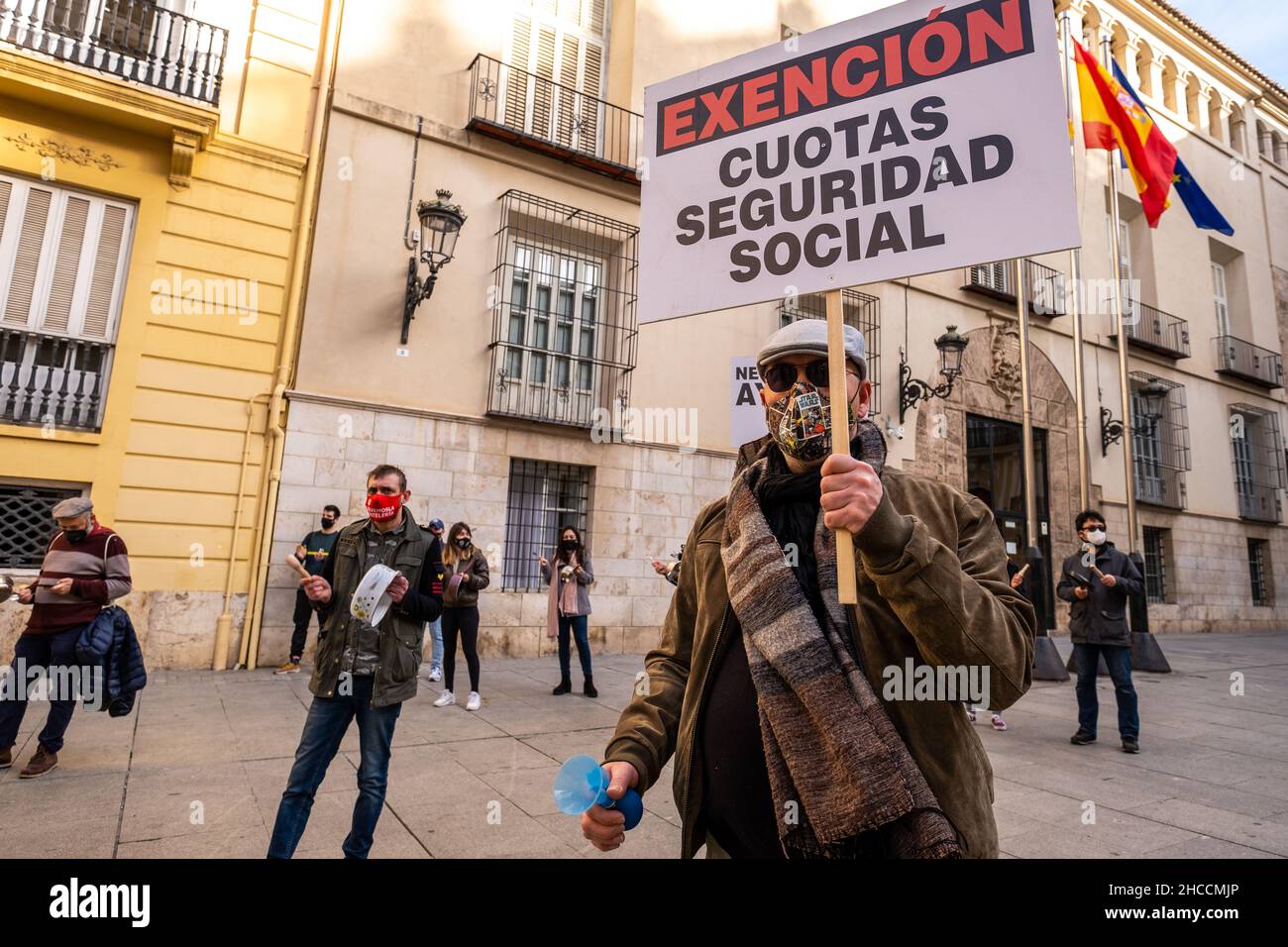 Valencia, Spain; January 21, 2021: Demonstrators against the measures against Covid taken against the hospitality sector by the local government. Stock Photo