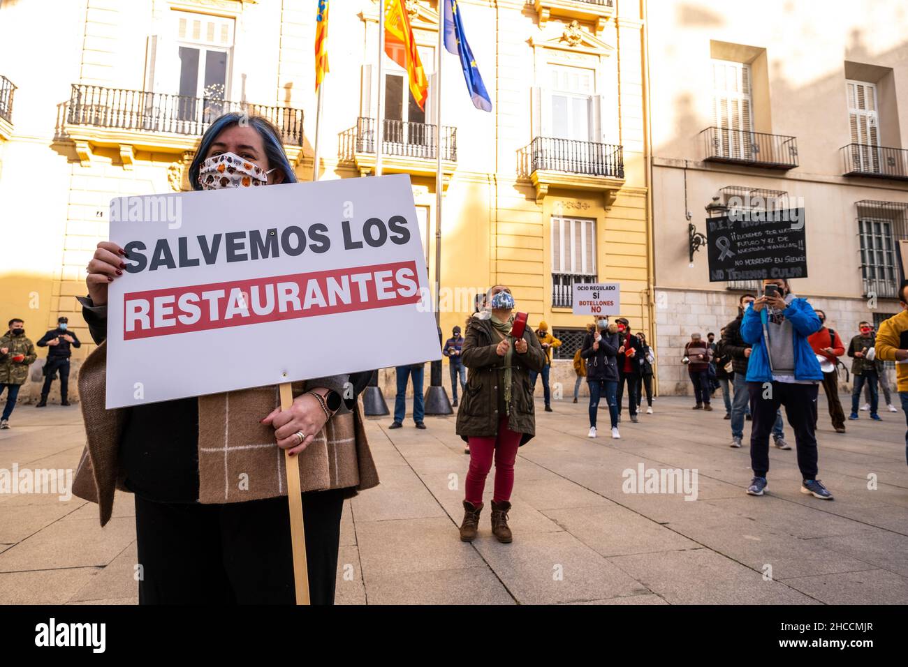 Valencia, Spain; January 21, 2021: Demonstrators against the measures against Covid taken against the hospitality sector by the local government. Stock Photo