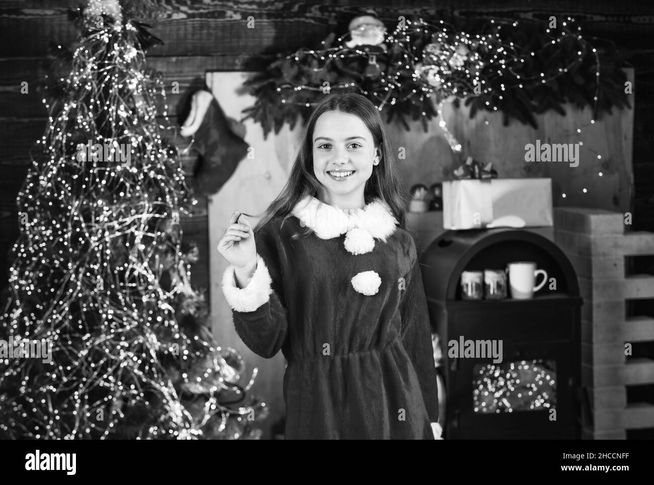 Happy childhood. Celebrate new year near christmas tree