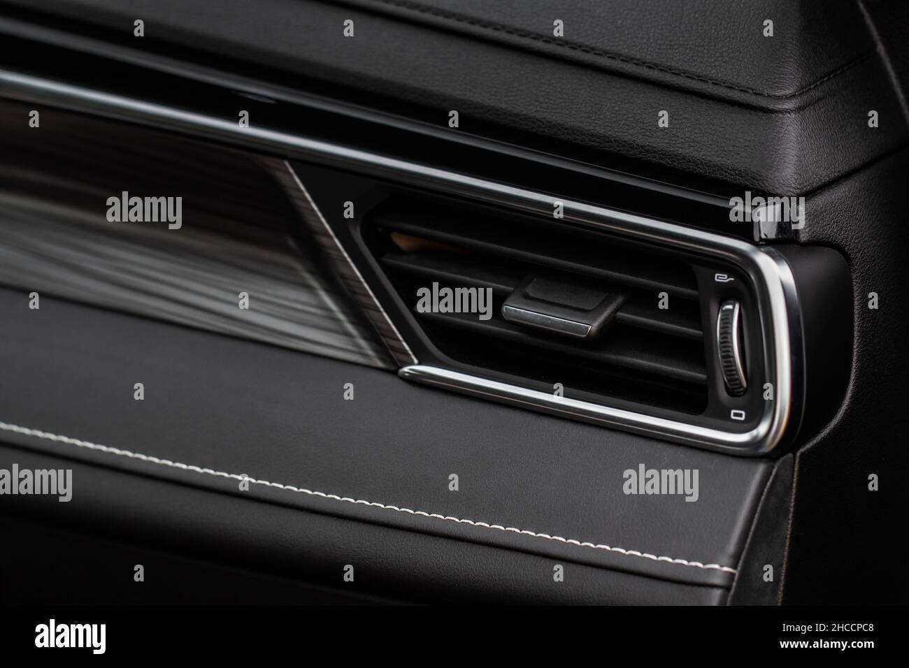 Car air conditioning close up view. The air conditioner flow inside the