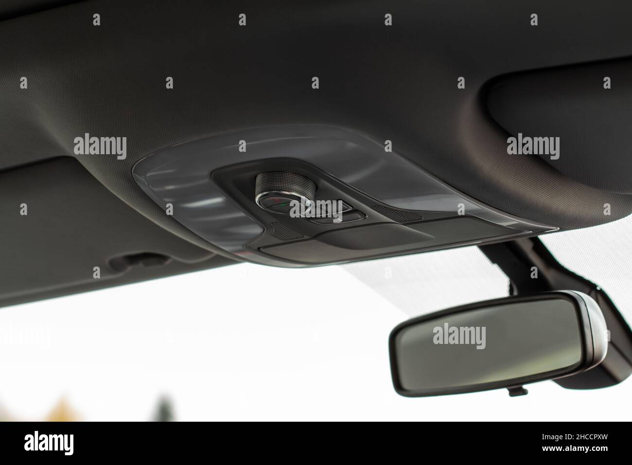 Close up image of the SOS button and car ceiling lamp in a car Stock ...