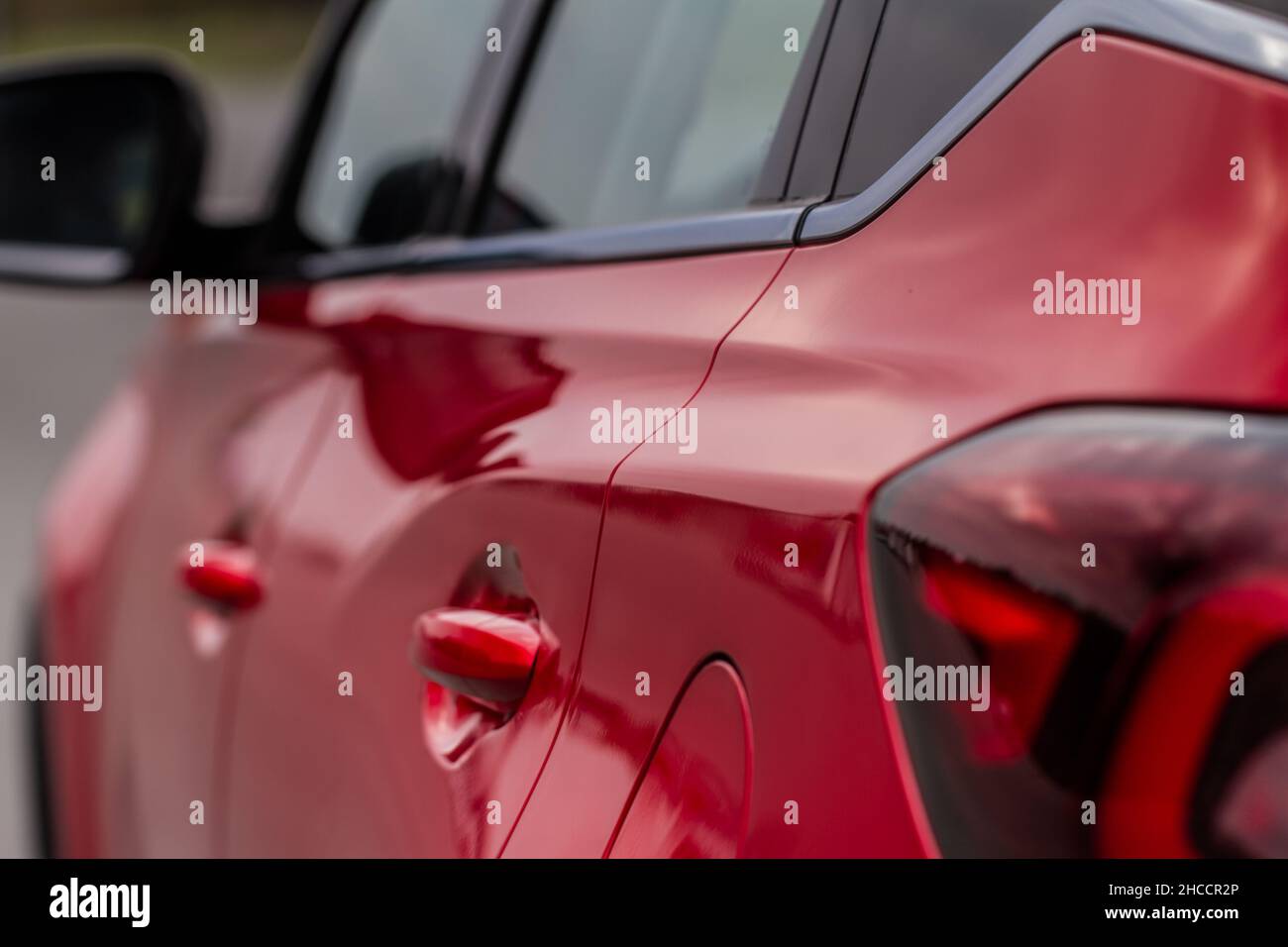 Red Car door handle. Keyless entry car door handle with touch sensor