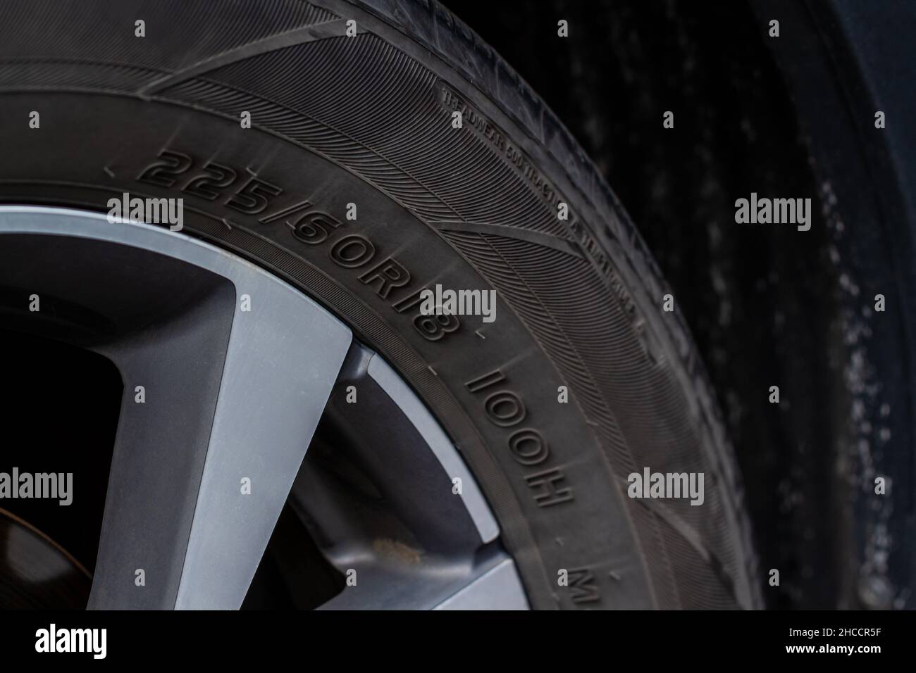 Close up view of tire with tire width, height and wheel diameter