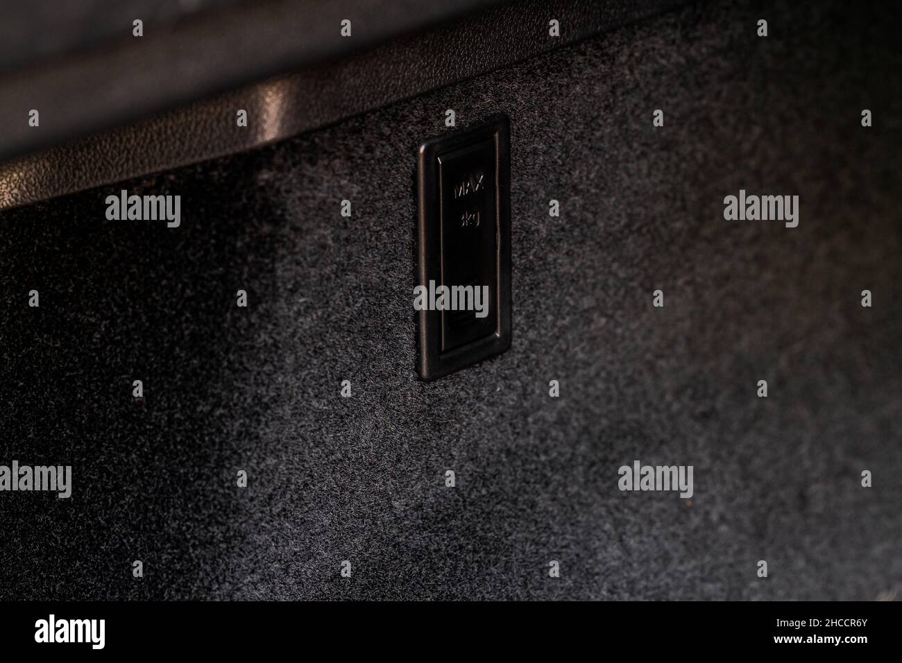 Closed hook for packages in the trunk of the car. Modern car trunk