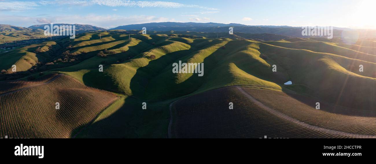 Evening sunlight shines on rolling hills in the scenic Tri-valley region of Northern California, just east of San Francisco Bay. Stock Photo