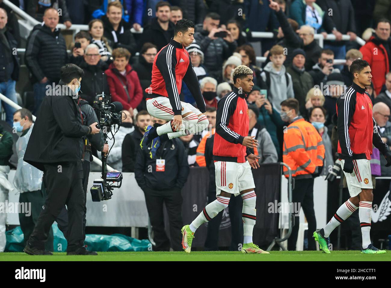 Cristiano Ronaldo #7 of Manchester United jumps up as he comes out on the pitch in, on 12/27/2021. (Photo by Mark Cosgrove/News Images/Sipa USA) Credit: Sipa USA/Alamy Live News Stock Photo