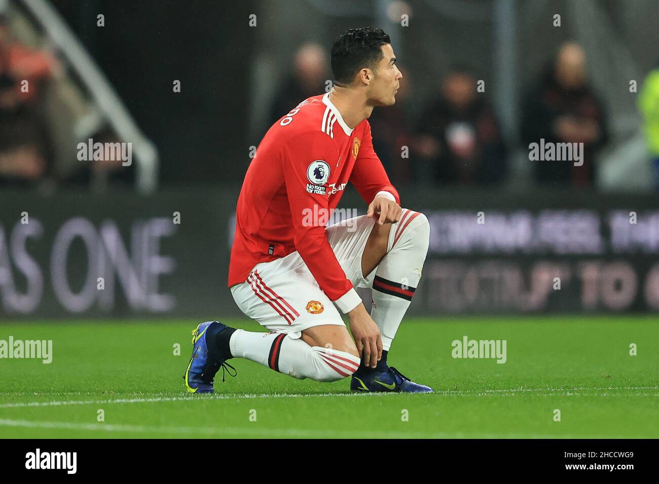 Cristiano Ronaldo #7 of Manchester United takes the knee at the start of the game in, on 12/27/2021. (Photo by Mark Cosgrove/News Images/Sipa USA) Credit: Sipa USA/Alamy Live News Stock Photo