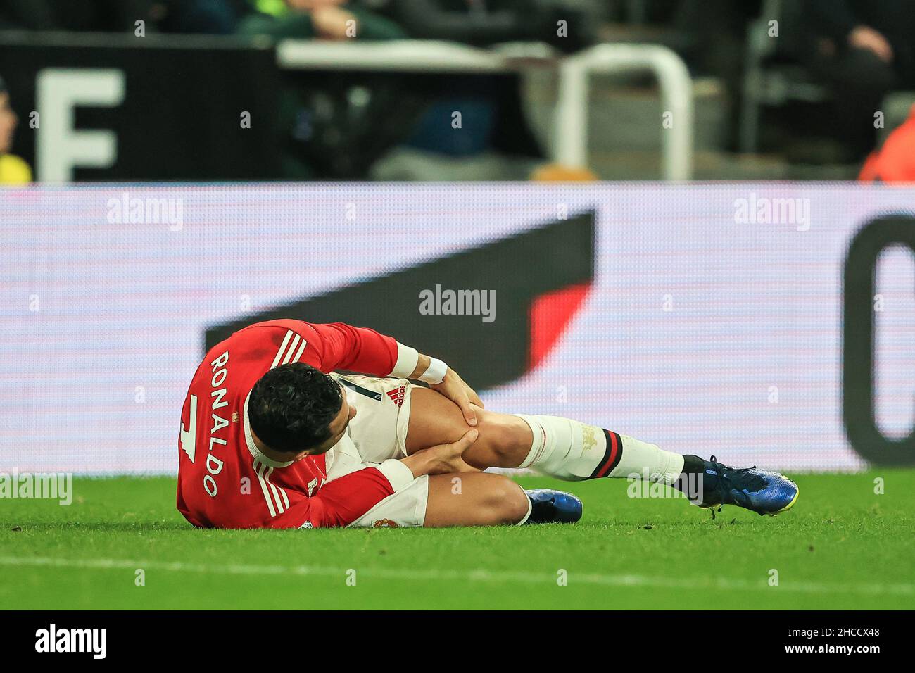 Cristiano Ronaldo #7 of Manchester United holds his knee on the ground in, on 12/27/2021. (Photo by Mark Cosgrove/News Images/Sipa USA) Credit: Sipa USA/Alamy Live News Stock Photo