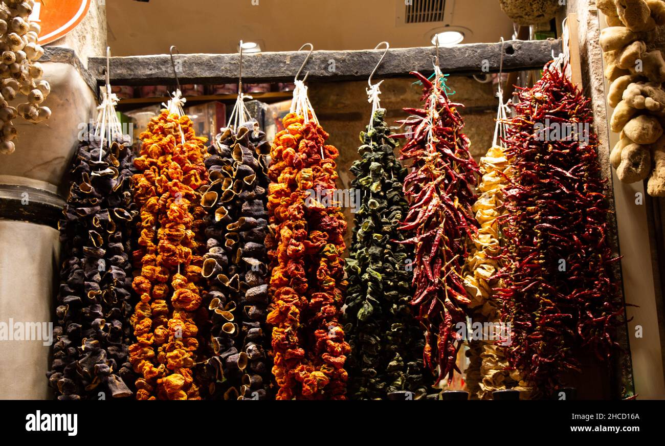 Dried vegetables on a rope in a market Stock Photo Alamy