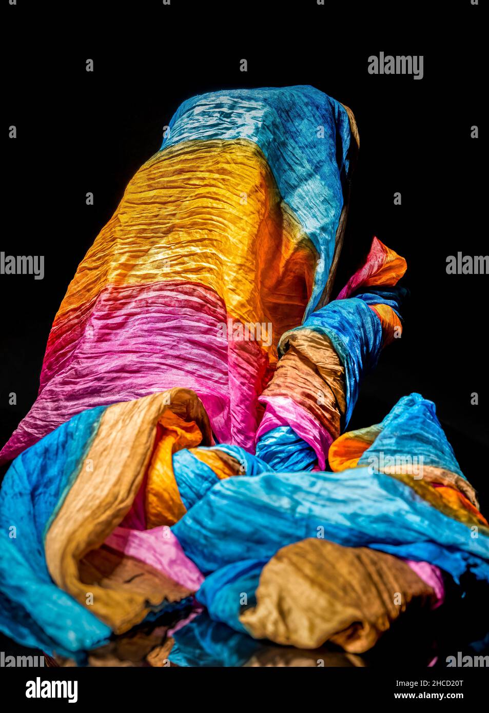 Colourful scarf on a black background, light painting Stock Photo - Alamy