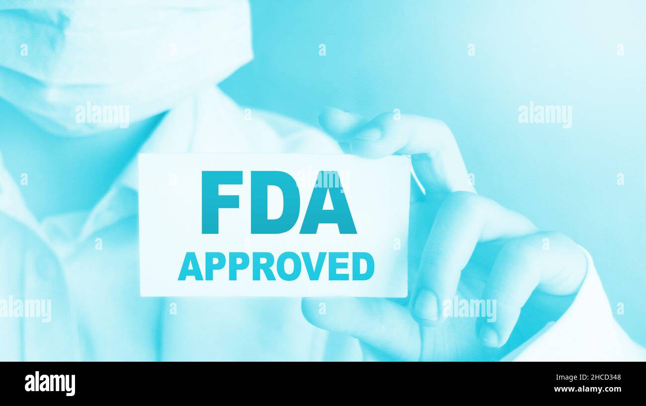 FDA Approved words on card Doctor shows. Food and Drugs Association