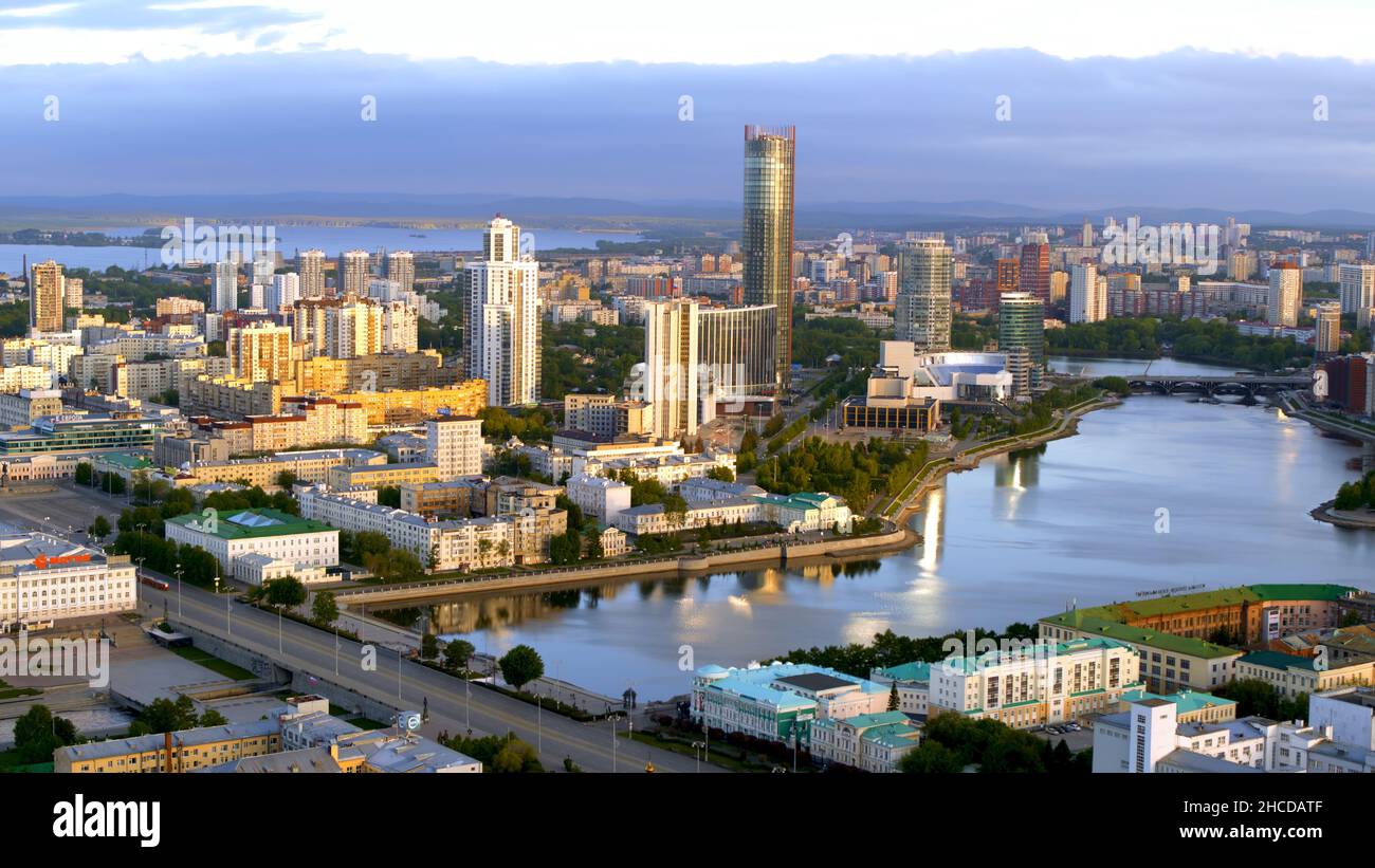 Breathtaking aerial view of historical center and Yekaterinburg -City district in summer. Close up of Vysotsky skyscraper glass facade. Stock Photo