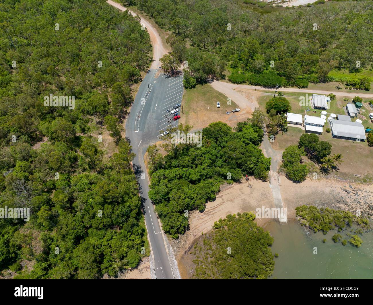 Drone return to home flight path to landing pad beside a boat ramp car
