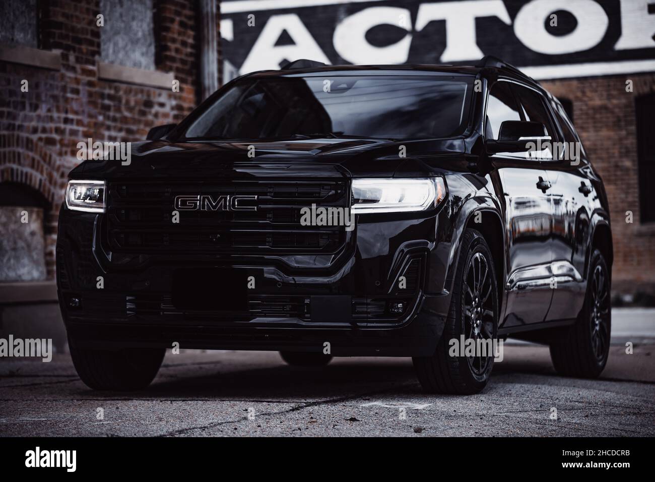 2021 gmc acadia denali suv with black exterior paint and black wheels