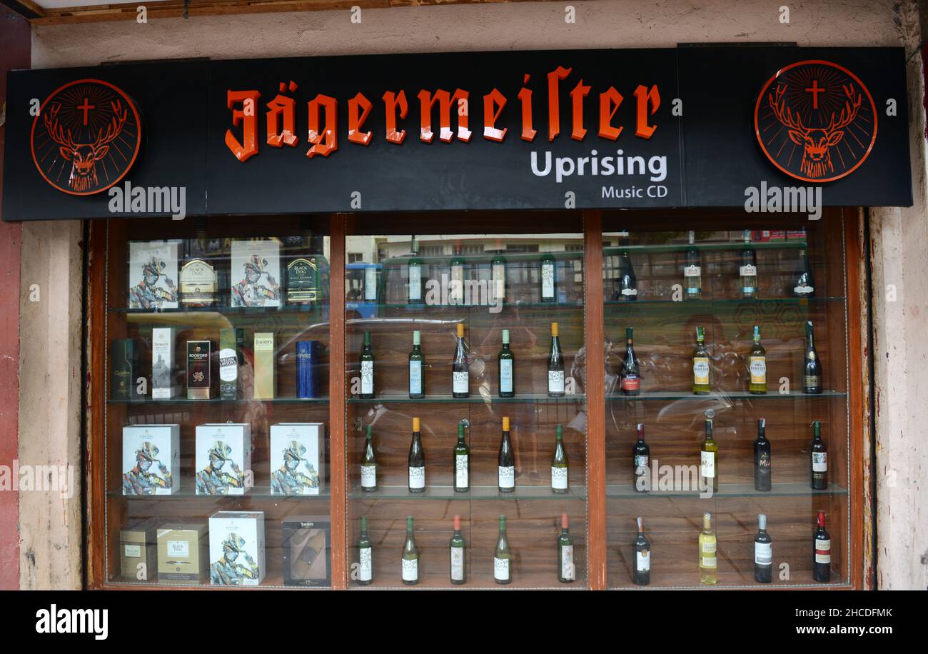 A wine shop in Bangalore. Wine is called ' Music CD ' as it is prohibited to advertise alcohol in its real name. Stock Photo