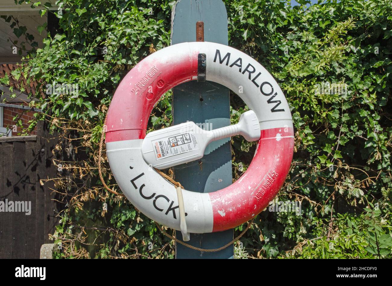 Marlow, UK - July 19, 2021: Lifebuoy and lifeline at Marlow Lock, Buckinghamshire on a sunny summer afternoon. Stock Photo