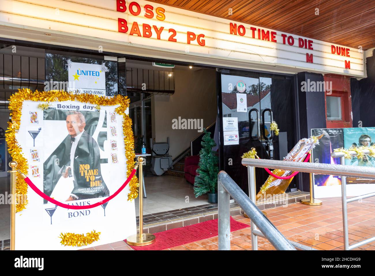 Bond film No Time to Die being shown and promoted on Boxing Day at a Sydney local cinema,NSW,Australia Stock Photo