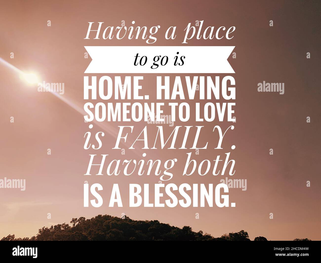 Blurred Image of sunset and hill with motivational and inspirational