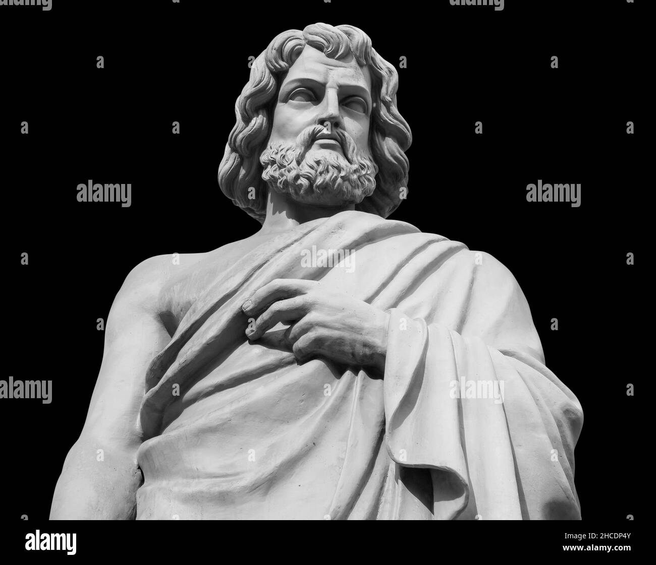 Statue of the biblical inventor Daedalus. Ancient sculpture isolated on black background. Classic antiquity man portrait Stock Photo