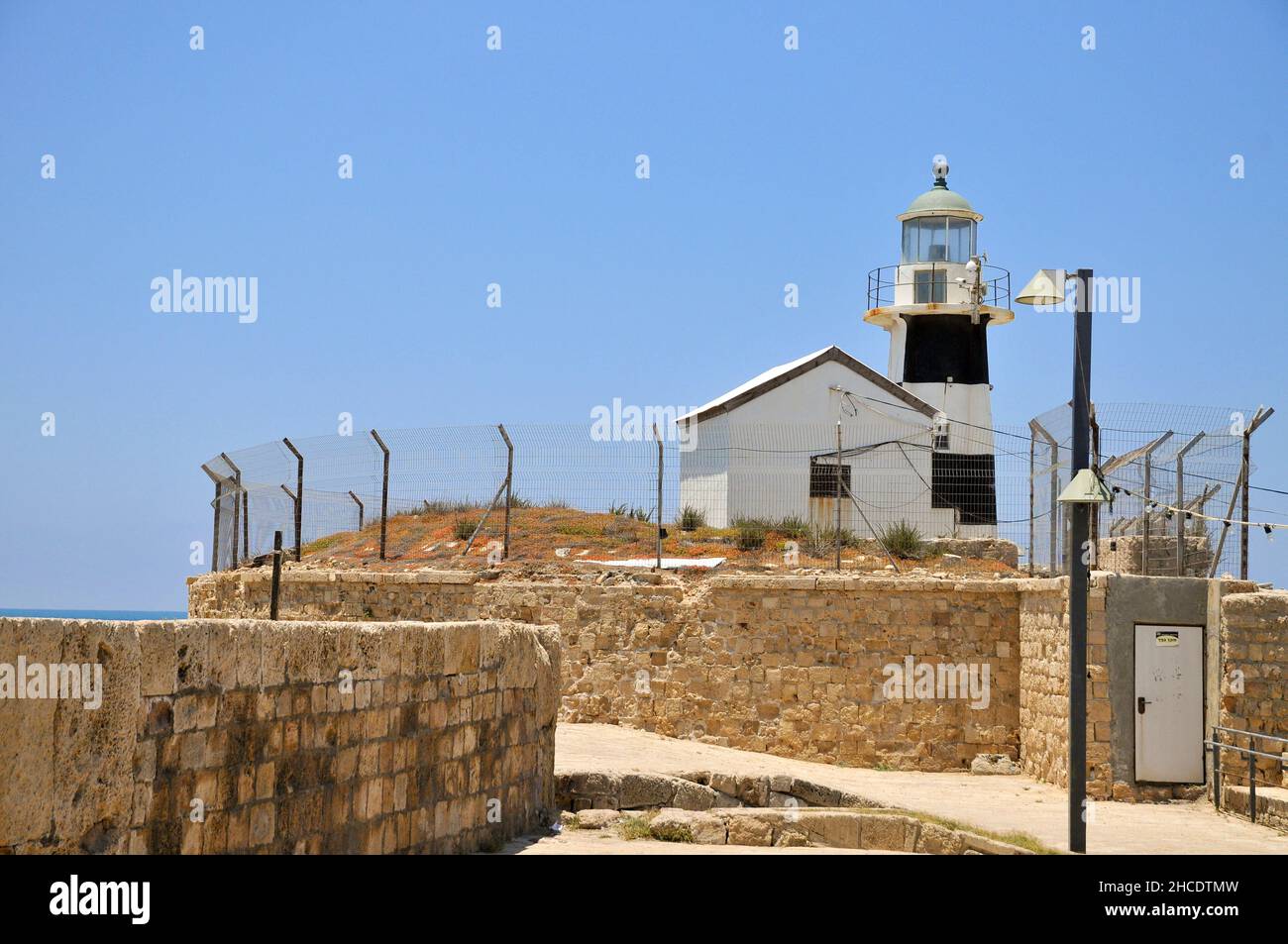 Israel, western Galilee, Acre, The lighthouse at the entrance to the ancient harbour Stock Photo