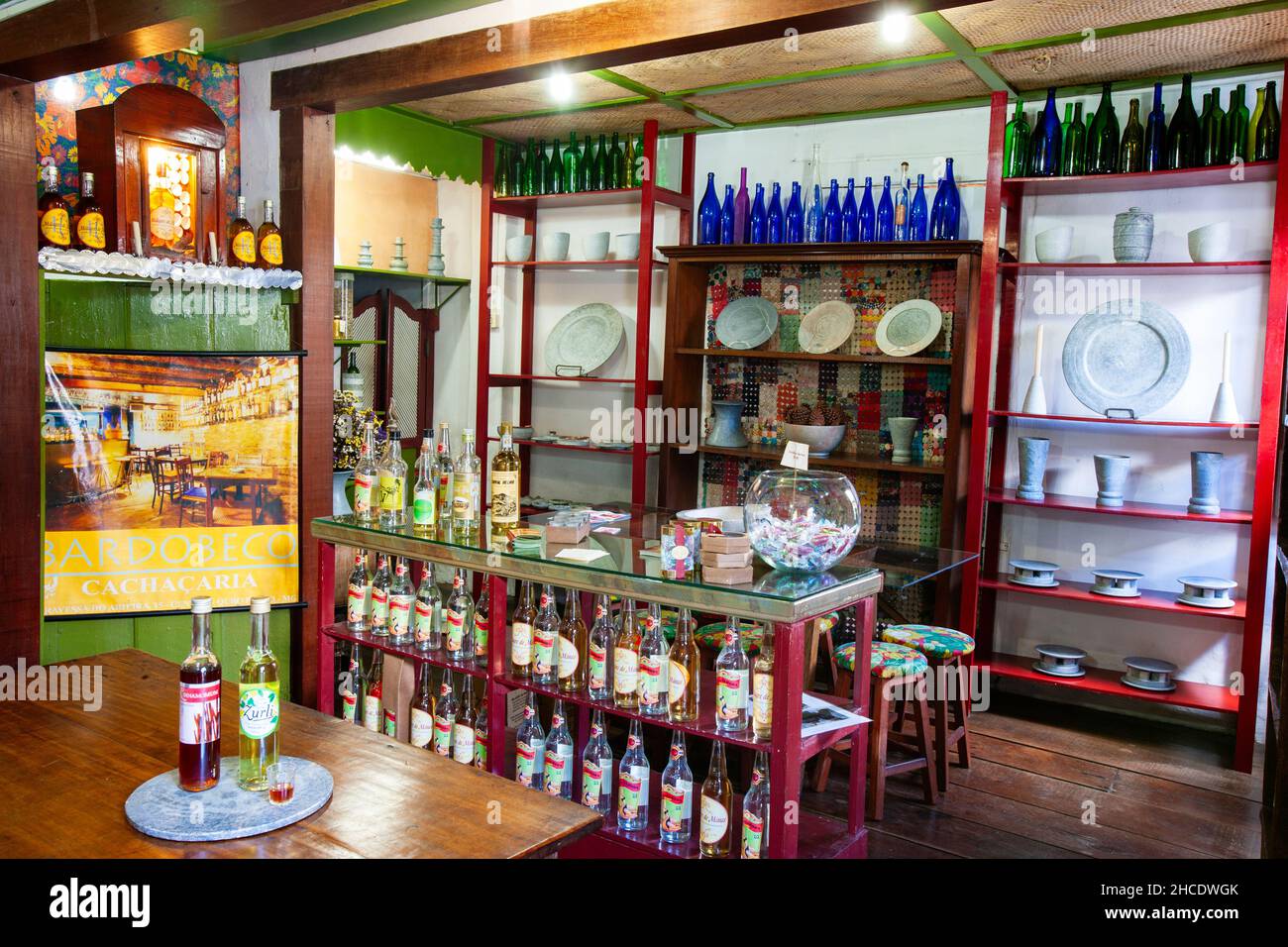 Display of locally made Bottles of Cachaca Milagre de Minas on sale at a Cachacaria. Ouro Preto, Minas Gerais State, Brazil Stock Photo