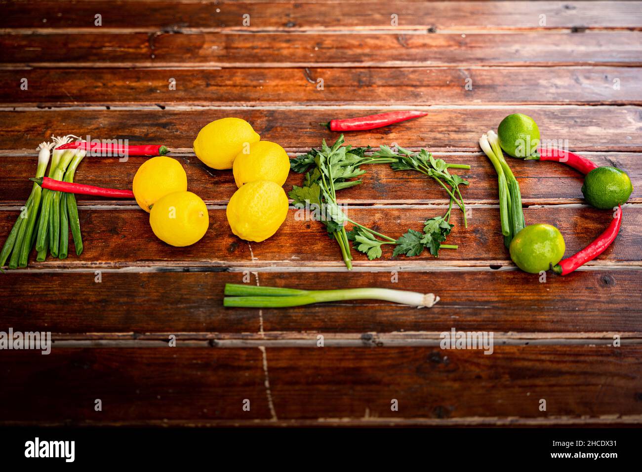 The word “food” is spelled out using fresh ingredients from a front