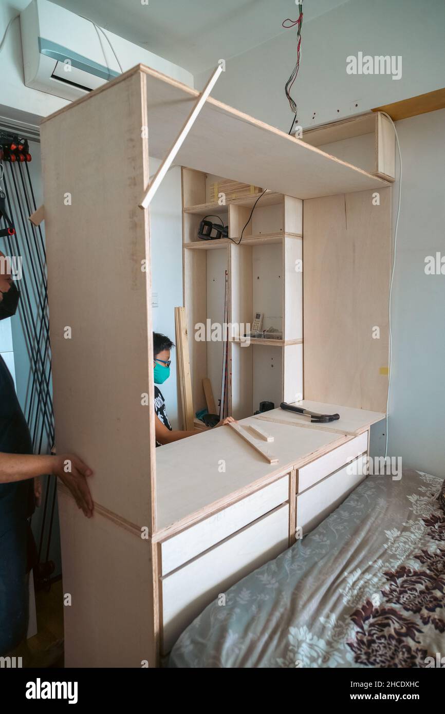 Wardrobe assembly in progress. DIY at home Stock Photo Alamy