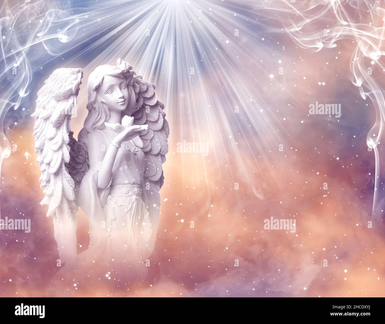 angel statue and mystical lights Stock Photo Alamy