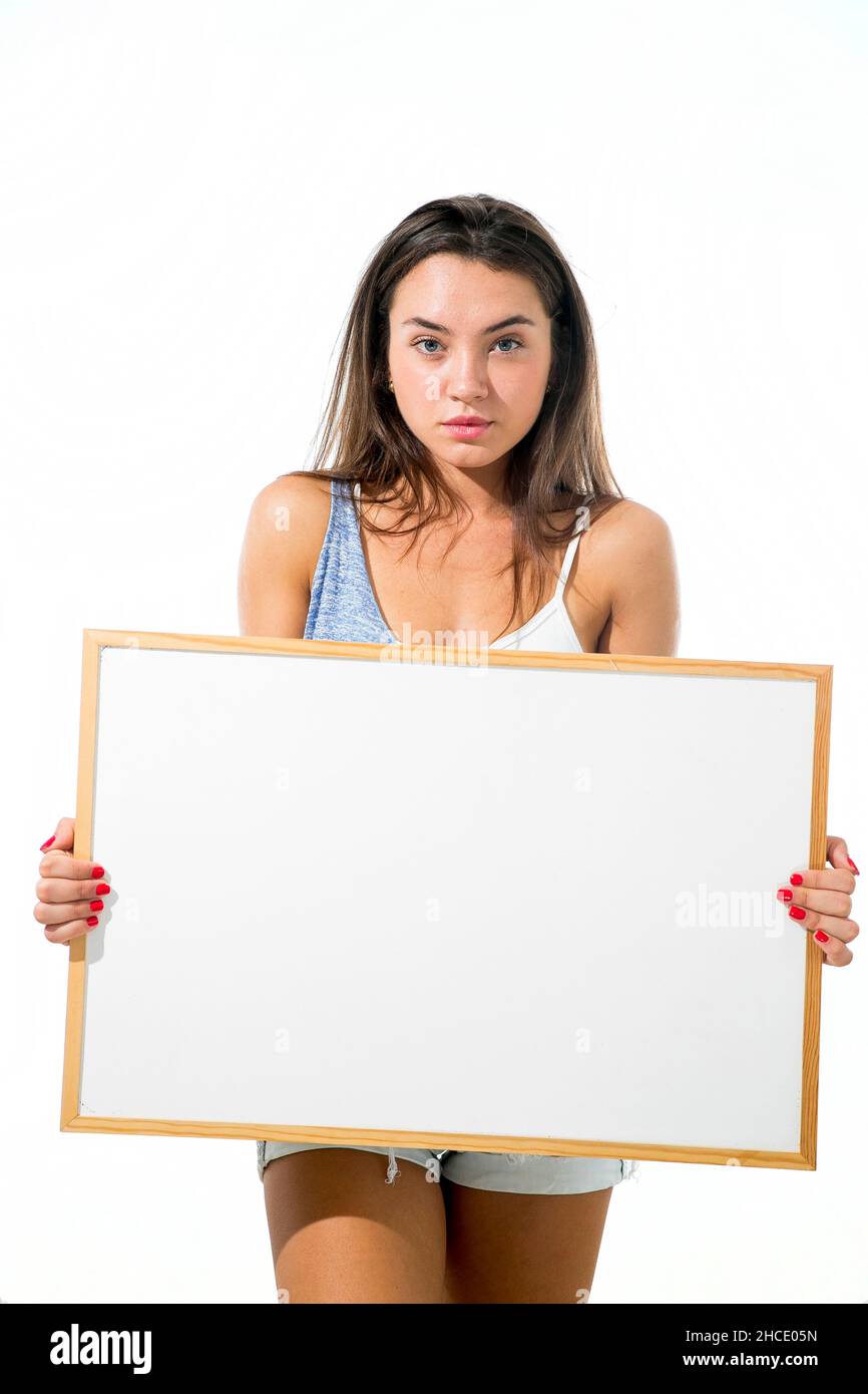 Young model hold a blank whiteboard ready for your text Stock Photo