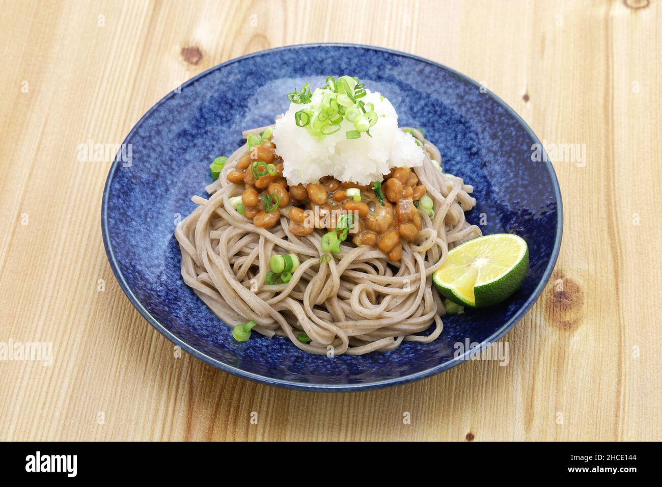 soba ( buckwheat noodles ) with natto (fermented soybeans) and grated daikon radish, Japanese food Stock Photo