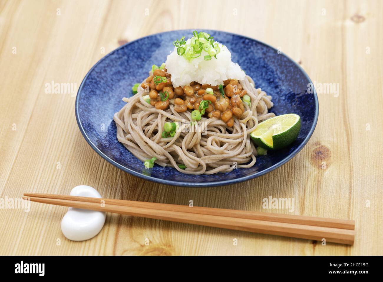 soba ( buckwheat noodles ) with natto (fermented soybeans) and grated daikon radish, Japanese food Stock Photo