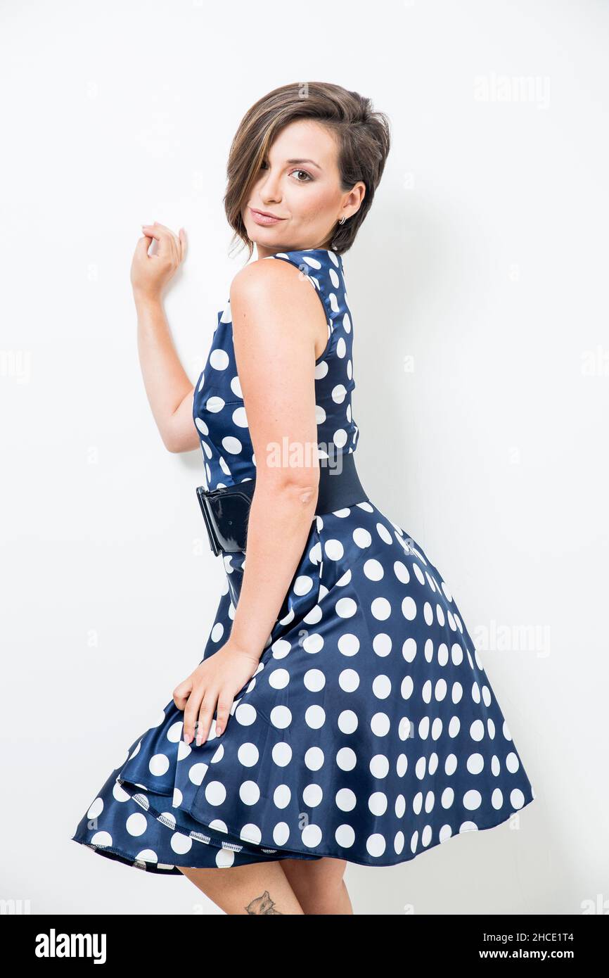 Young woman in polka dot dress Stock Photo - Alamy Young woman in polka dot dress Stock Photo - Alamy