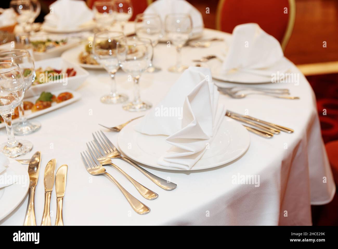 Place setting in a restaurant, formal dinner Stock Photo