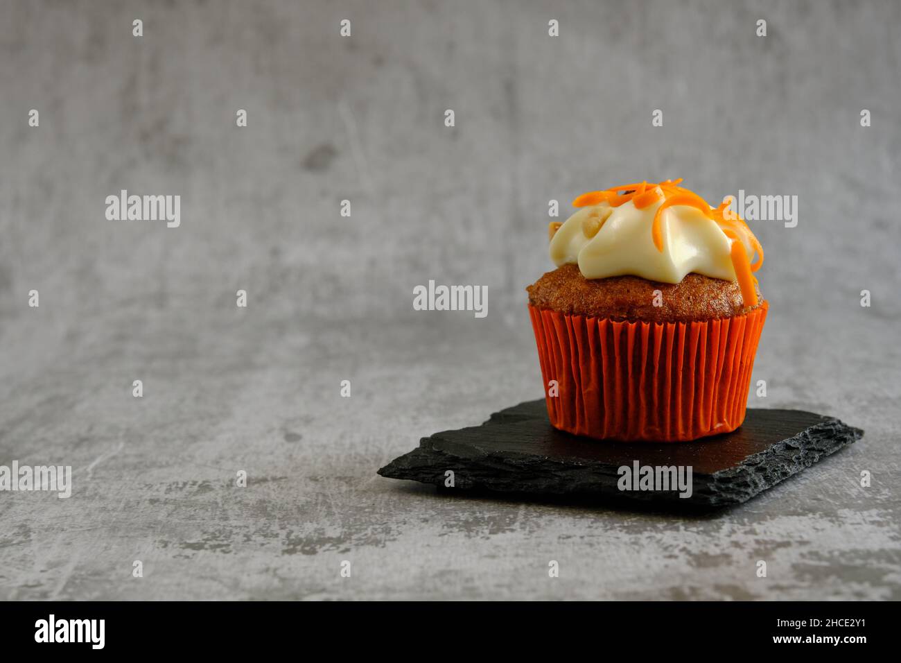 carrot muffin on a gray background Stock Photo