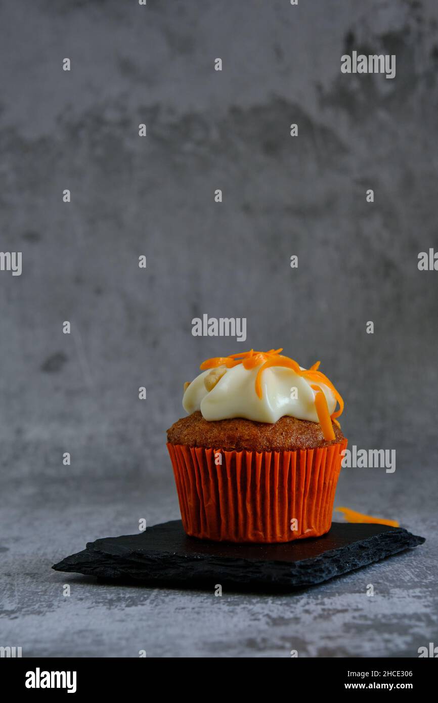 carrot muffin on a gray background Stock Photo