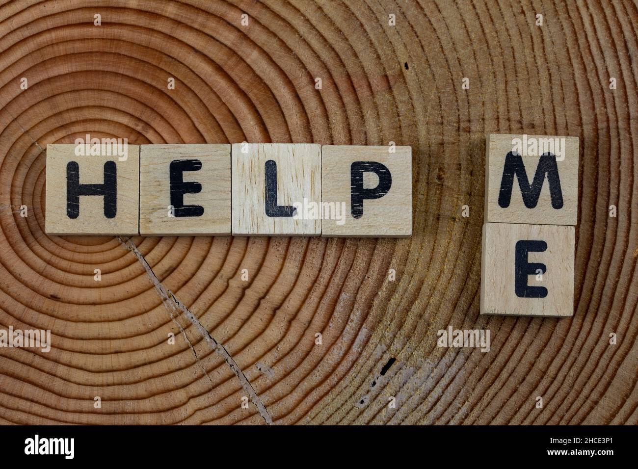Help me symbol. Wooden cubes words help me background. Business