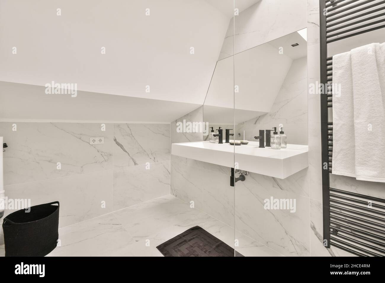 Modern white marble bathroom interior design with glass shower cabin ...