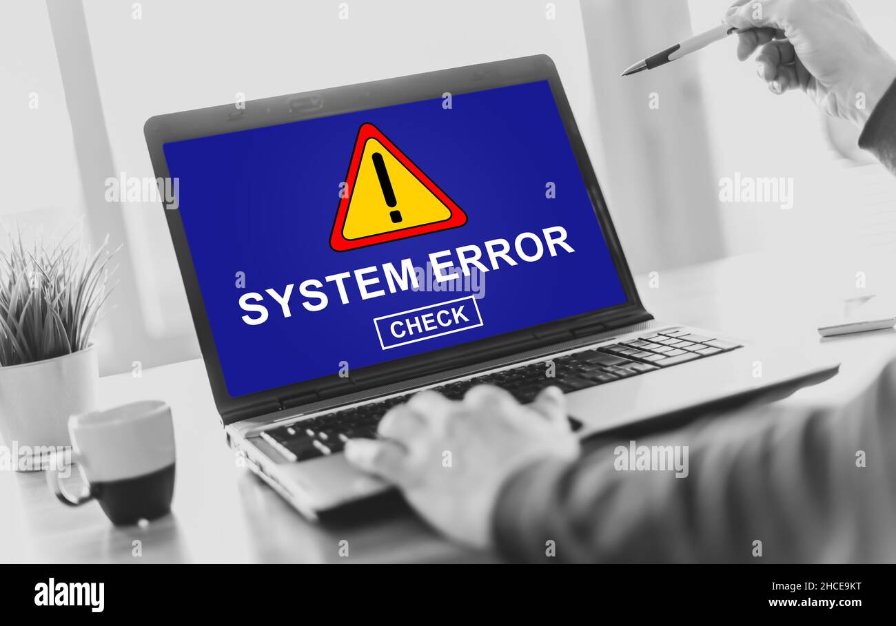 Laptop screen displaying a system error concept Stock Photo - Alamy