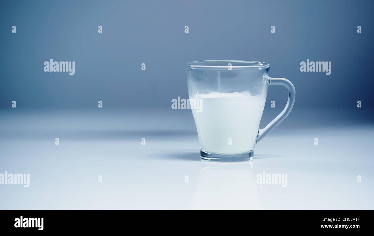 glass of fresh milk on white and grey,stock image Stock Photo