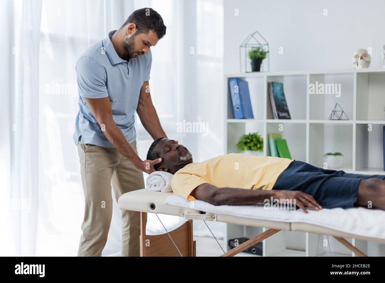 Interracial massage hi-res stock photography and Page 3 - Alamy