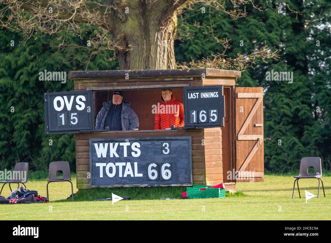 Village cricket match between the Derbyshire villages of Brailsford and Clifton on the polo ground at Osmaston Derbyshire Stock Photo