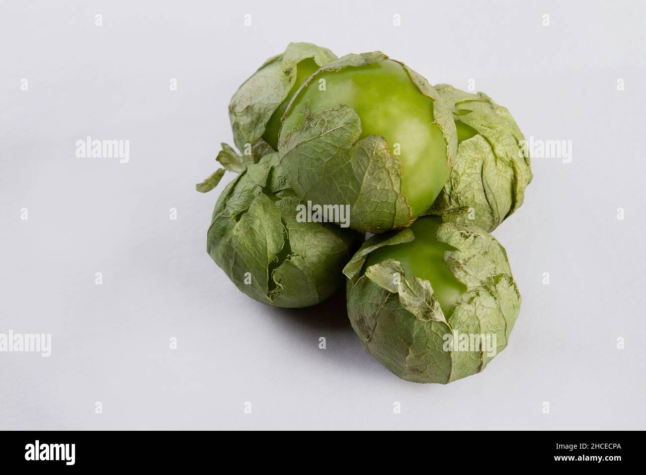 Fresh Tomatillos Isolated on a white background Stock Photo