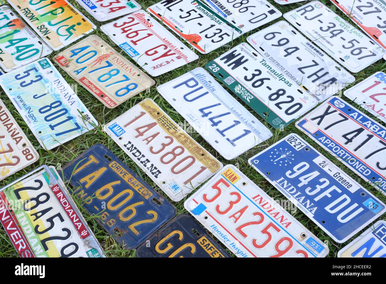 USA old vehicles license plates placed on the grass. Festival OLD CAR Land. May 12, 2019. KIev, Ukraine Stock Photo
