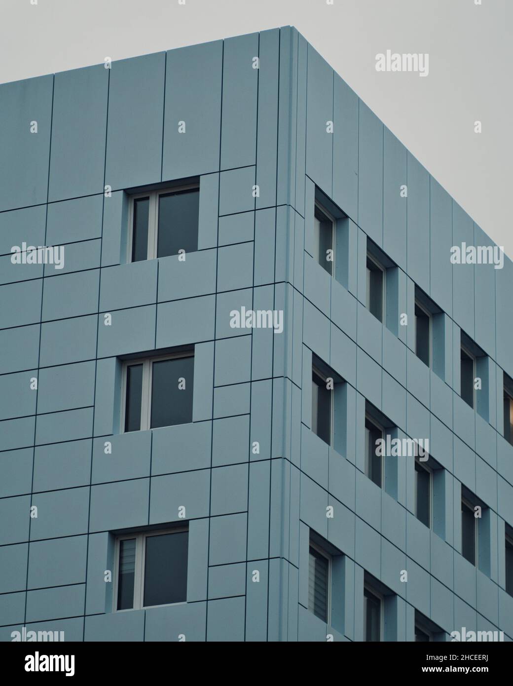 A vertical shot of a modern building facade Stock Photo - Alamy