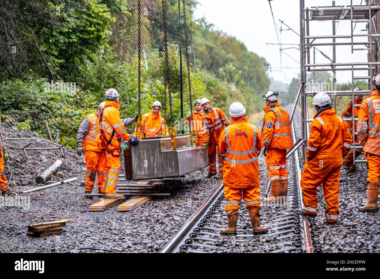 Building Rail Way Railway workers building new railway and knocking down bridges Stock ...