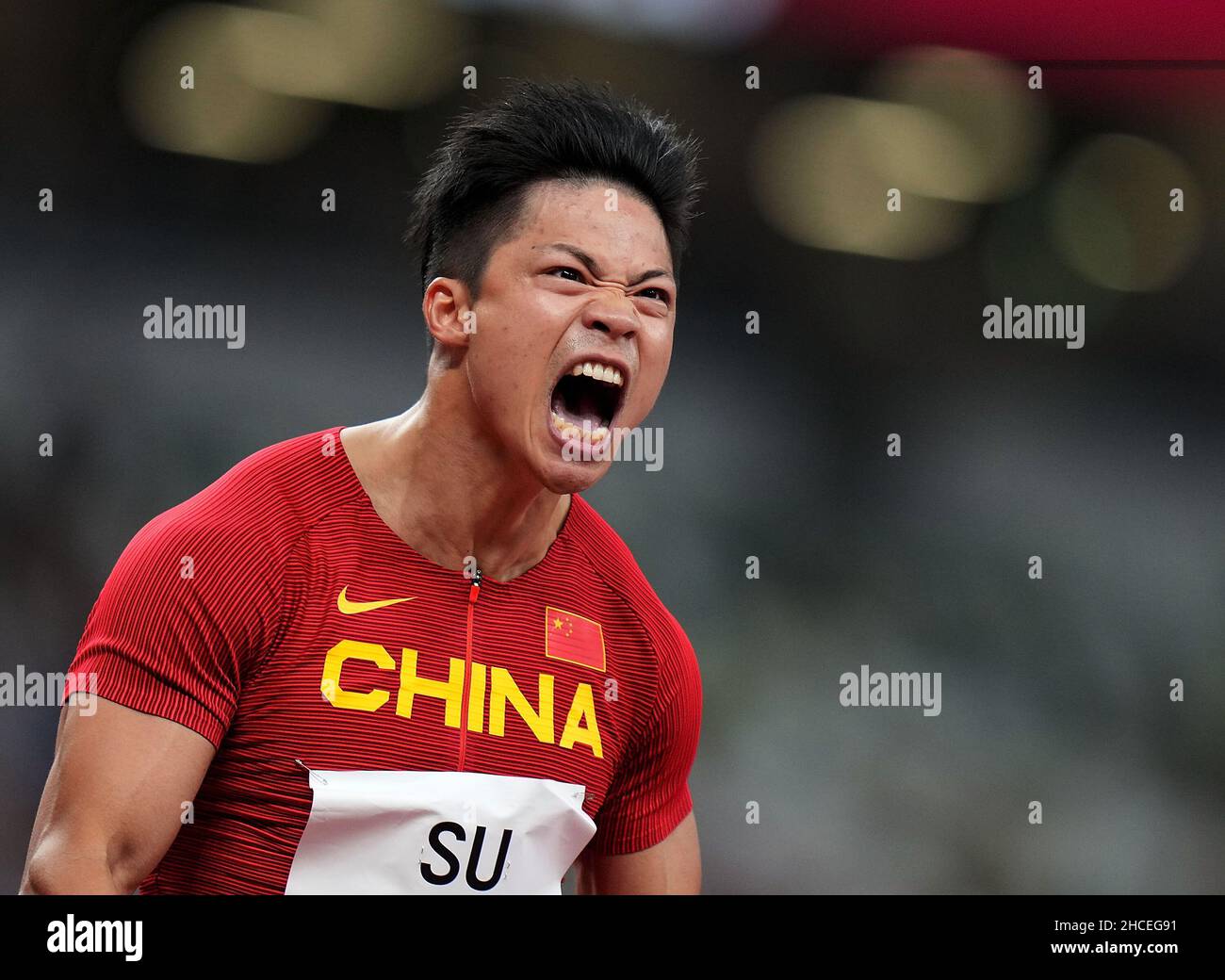 Beijing, China. 1st Aug, 2021. File photo taken on Aug. 1, 2021 shows Su Bingtian of China reacting after the men's 100m semifinal at the Tokyo 2020 Olympic Games, in Tokyo, Japan. Su Bingtian set a new Asian record in the men's 100-meter dash with a time of 9.83 seconds at the Tokyo Olympics semifinals to become the first Chinese sprinter to qualify for the final of the event. The 32-year-old also led the Chinese men's 4x100m relay team to finish fourth. He was then crowned the fastest man at the National Games in 9.95 seconds. Credit: Lui Siu Wai/Xinhua/Alamy Live News Stock Photo