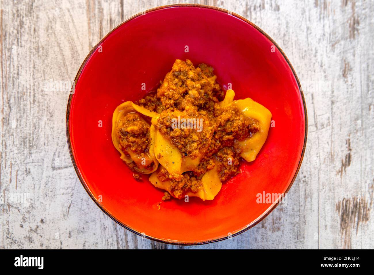 Typical Pumpking Cappellacci of Ferrara with ragù Stock Photo