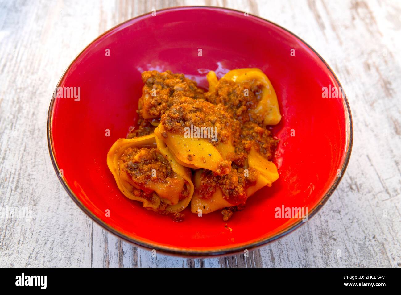 Typical Pumpking Cappellacci of Ferrara with ragù Stock Photo