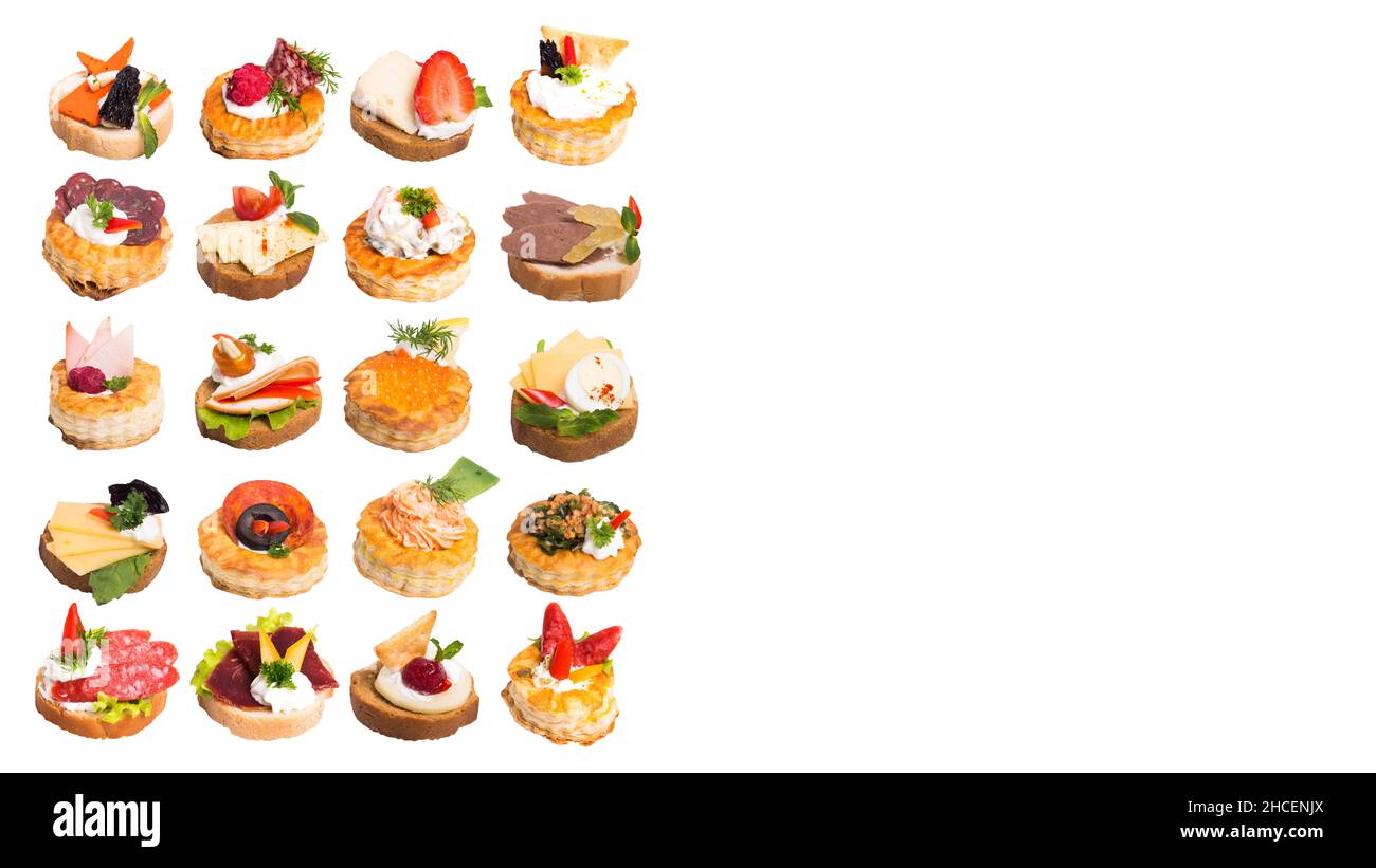 Canapes with different berries and toppings isolated on a white ...